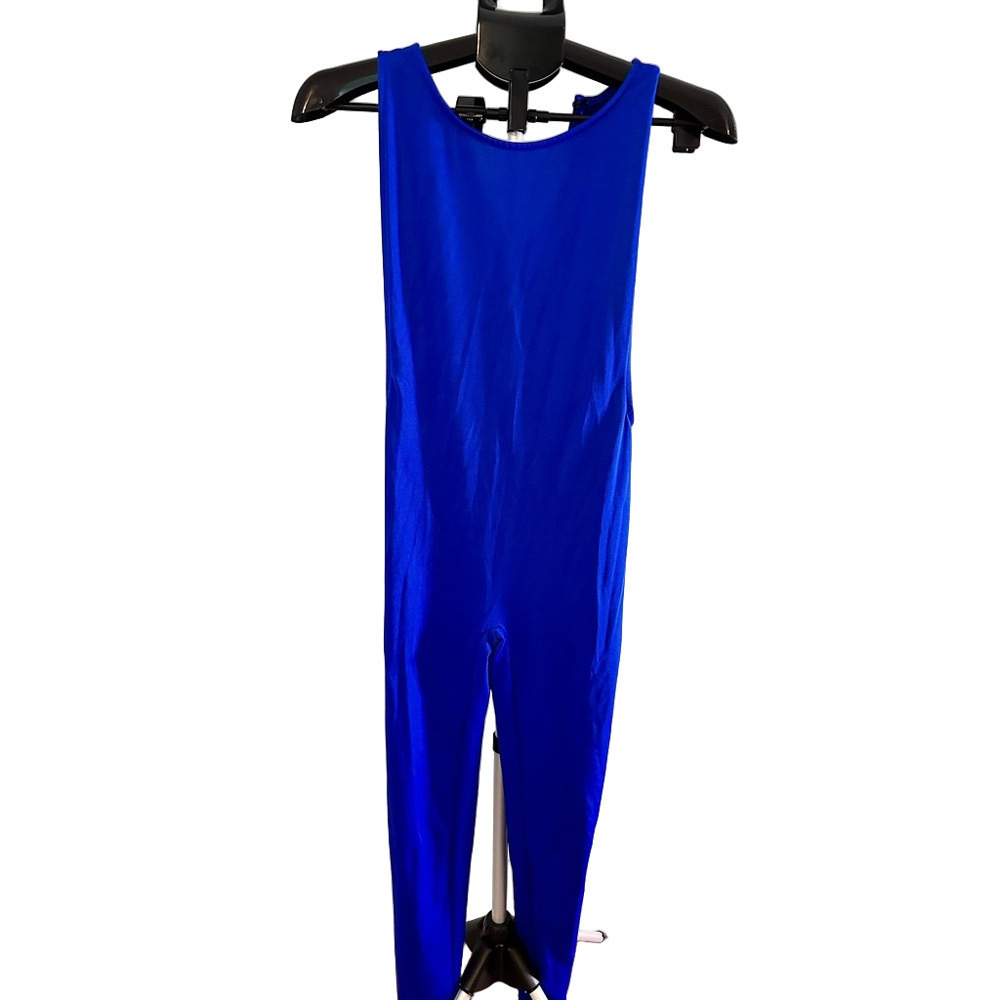 BLUE JUMPSUIT WITH DEEP CUT ARM HOLES